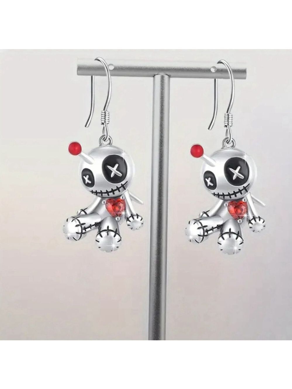 Voodoo Doll with a pin in its head Earrings stylish and fun to wear